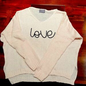 Wooden Ships “Love” sweater in light pink, with black script. Size S/M.
